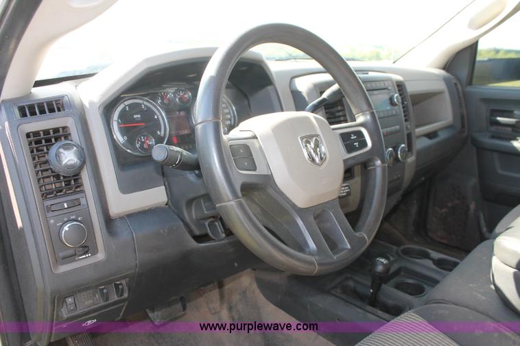 image for item K8915 2011 Dodge Ram 3500HD Quad Cab flatbed pickup truck