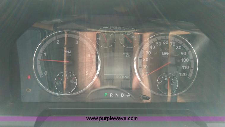 image for item K8915 2011 Dodge Ram 3500HD Quad Cab flatbed pickup truck