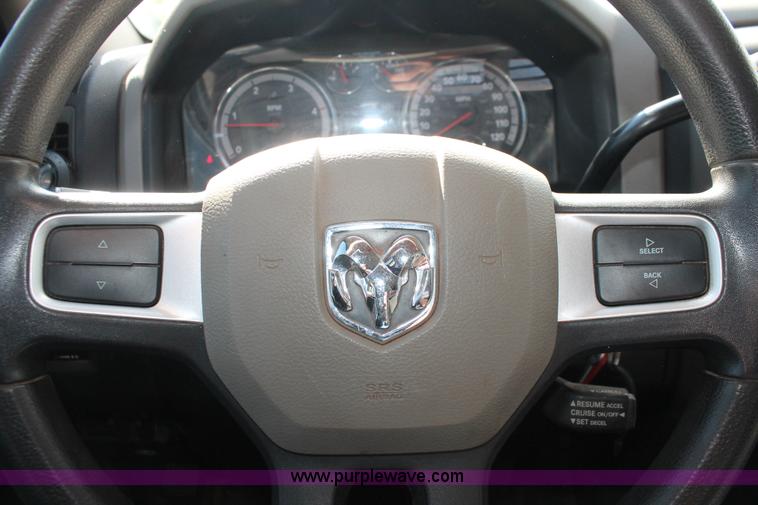 image for item K8915 2011 Dodge Ram 3500HD Quad Cab flatbed pickup truck