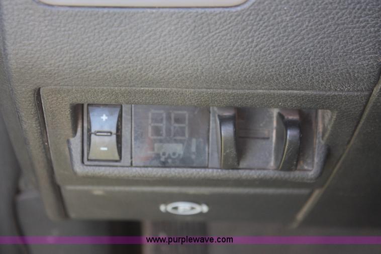 image for item K8915 2011 Dodge Ram 3500HD Quad Cab flatbed pickup truck