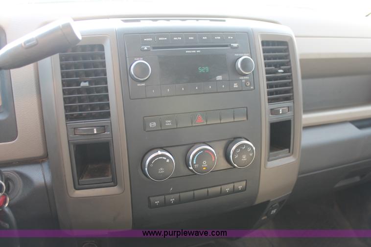 image for item K8915 2011 Dodge Ram 3500HD Quad Cab flatbed pickup truck