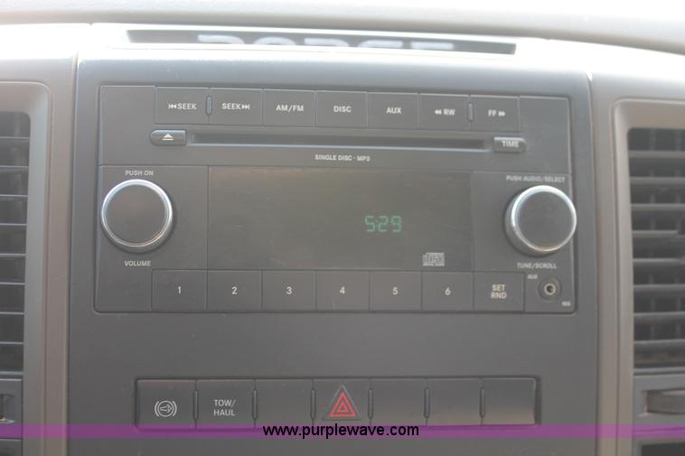 image for item K8915 2011 Dodge Ram 3500HD Quad Cab flatbed pickup truck