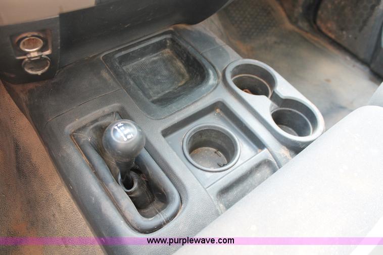 image for item K8915 2011 Dodge Ram 3500HD Quad Cab flatbed pickup truck