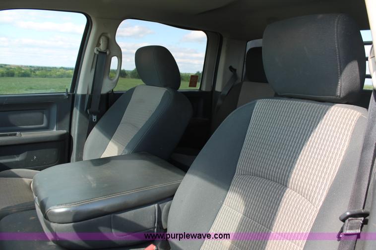 image for item K8915 2011 Dodge Ram 3500HD Quad Cab flatbed pickup truck