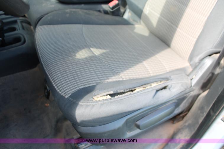 image for item K8915 2011 Dodge Ram 3500HD Quad Cab flatbed pickup truck