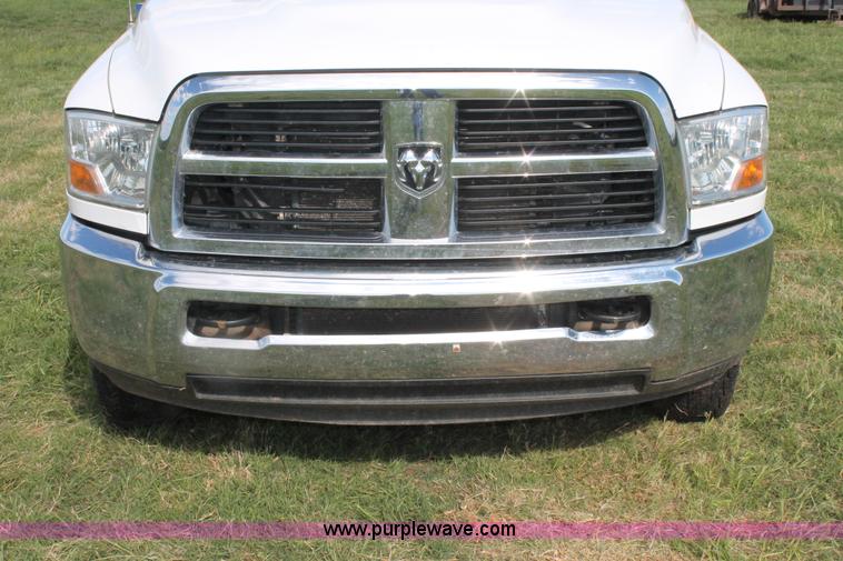 image for item K8915 2011 Dodge Ram 3500HD Quad Cab flatbed pickup truck