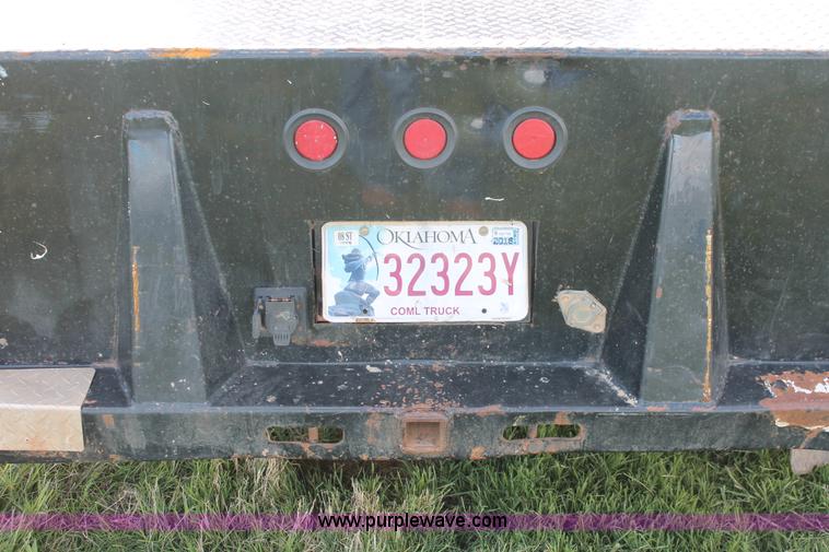 image for item K8915 2011 Dodge Ram 3500HD Quad Cab flatbed pickup truck