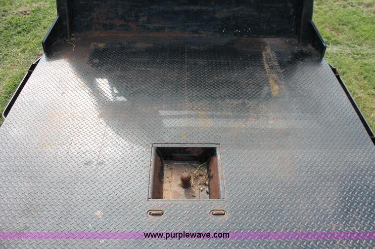 image for item K8915 2011 Dodge Ram 3500HD Quad Cab flatbed pickup truck