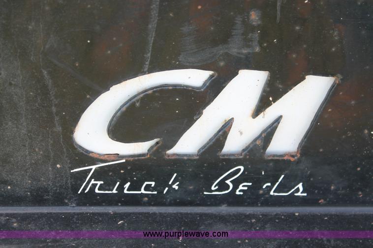 image for item K8915 2011 Dodge Ram 3500HD Quad Cab flatbed pickup truck