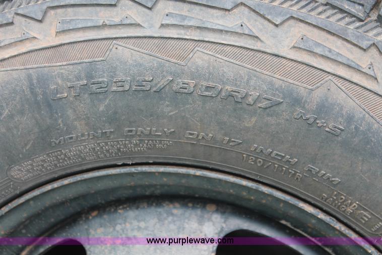 image for item K8915 2011 Dodge Ram 3500HD Quad Cab flatbed pickup truck