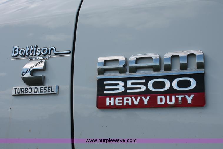 image for item K8915 2011 Dodge Ram 3500HD Quad Cab flatbed pickup truck