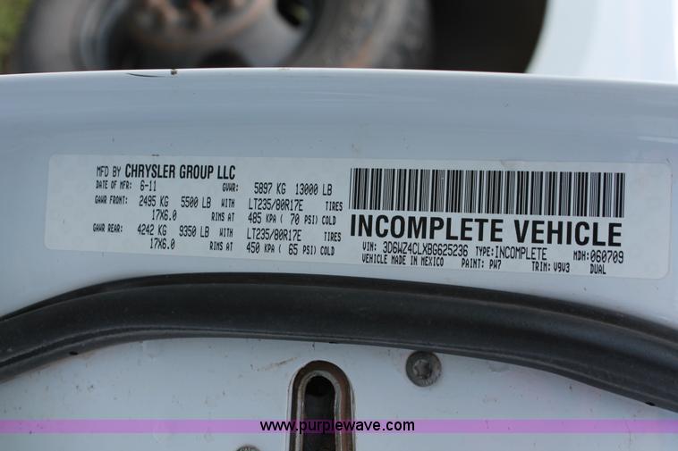 image for item K8915 2011 Dodge Ram 3500HD Quad Cab flatbed pickup truck