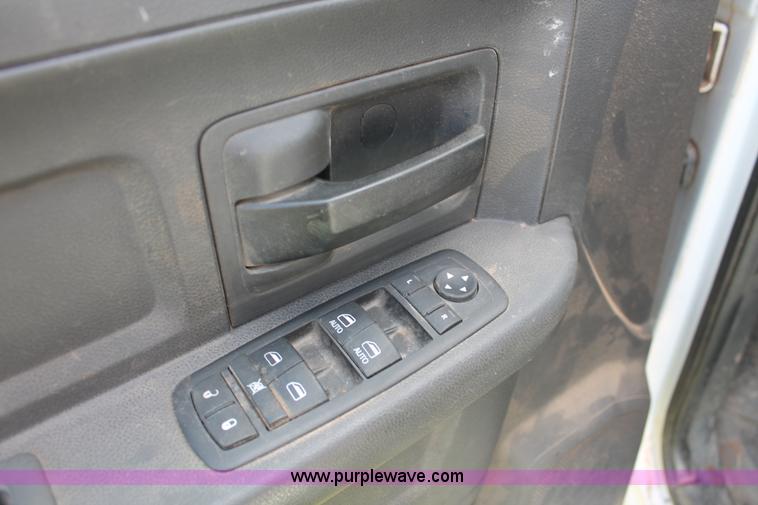 image for item K8916 2011 Dodge Ram 3500HD Quad Cab flatbed pickup truck