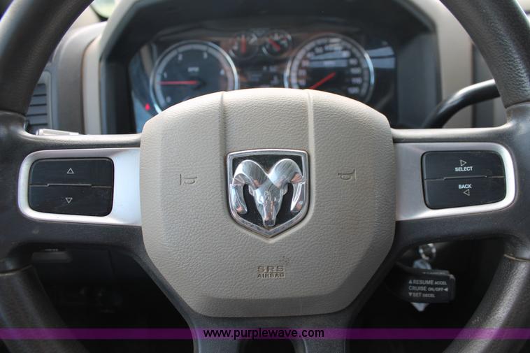 image for item K8916 2011 Dodge Ram 3500HD Quad Cab flatbed pickup truck