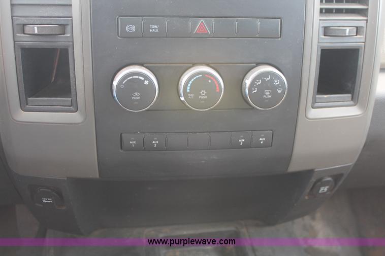 image for item K8916 2011 Dodge Ram 3500HD Quad Cab flatbed pickup truck