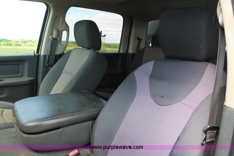 image for item K8916 2011 Dodge Ram 3500HD Quad Cab flatbed pickup truck