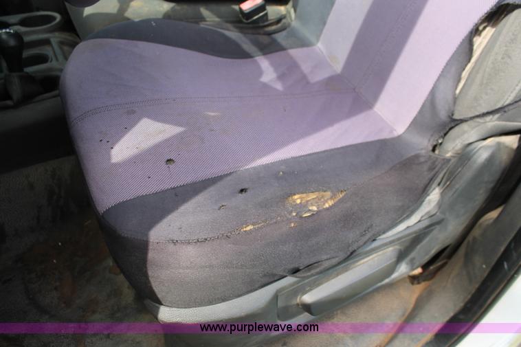 image for item K8916 2011 Dodge Ram 3500HD Quad Cab flatbed pickup truck