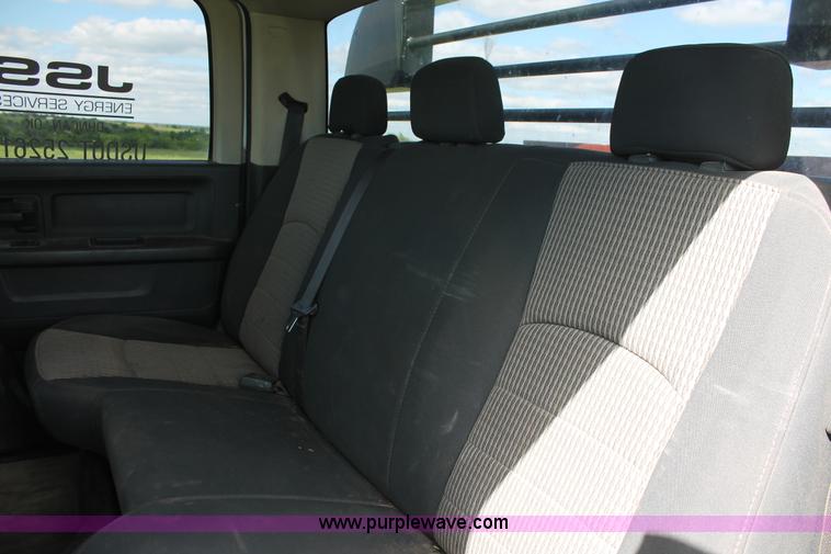 image for item K8916 2011 Dodge Ram 3500HD Quad Cab flatbed pickup truck