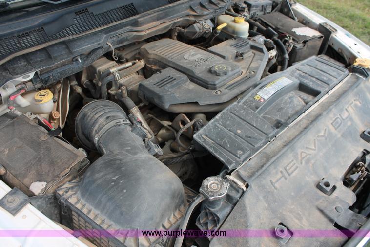 image for item K8916 2011 Dodge Ram 3500HD Quad Cab flatbed pickup truck