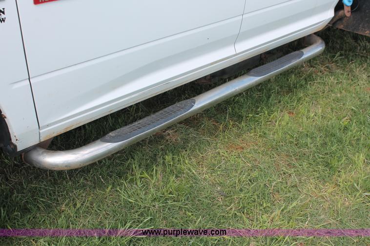 image for item K8916 2011 Dodge Ram 3500HD Quad Cab flatbed pickup truck