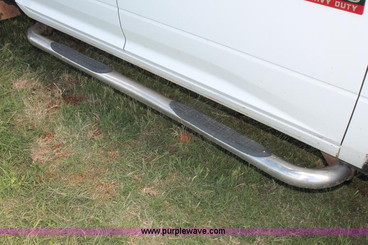 image for item K8916 2011 Dodge Ram 3500HD Quad Cab flatbed pickup truck