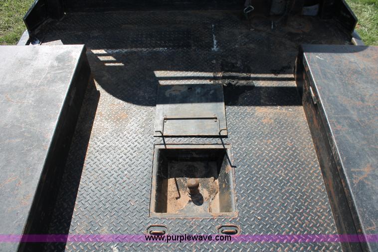 image for item K8916 2011 Dodge Ram 3500HD Quad Cab flatbed pickup truck