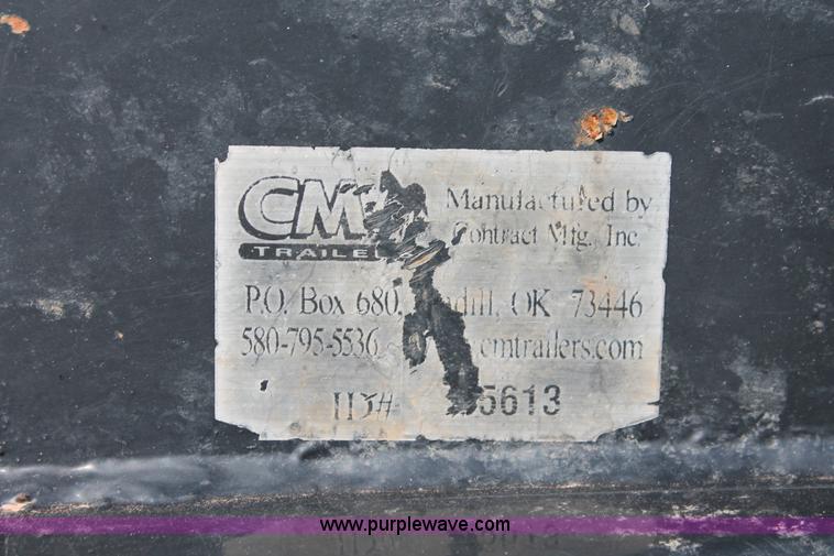 image for item K8916 2011 Dodge Ram 3500HD Quad Cab flatbed pickup truck