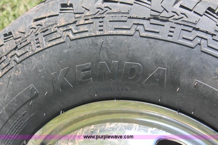 image for item K8916 2011 Dodge Ram 3500HD Quad Cab flatbed pickup truck