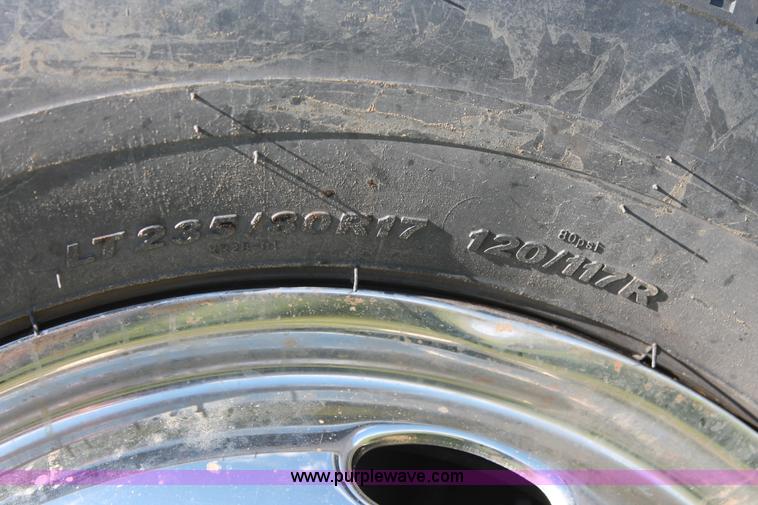 image for item K8916 2011 Dodge Ram 3500HD Quad Cab flatbed pickup truck