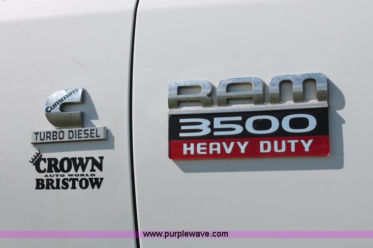 image for item K8916 2011 Dodge Ram 3500HD Quad Cab flatbed pickup truck