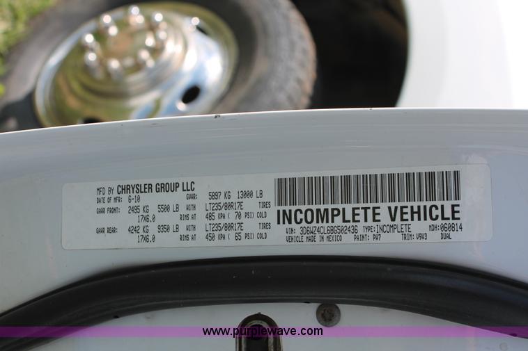 image for item K8916 2011 Dodge Ram 3500HD Quad Cab flatbed pickup truck