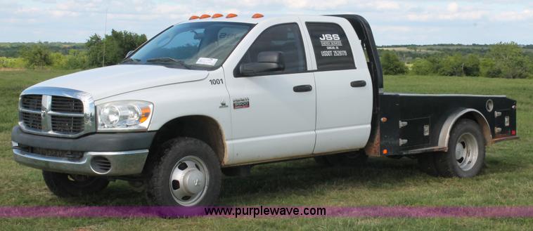 image for item K8917 2007 Dodge Ram 3500HD Quad Cab flatbed pickup truck