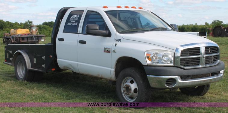 image for item K8917 2007 Dodge Ram 3500HD Quad Cab flatbed pickup truck