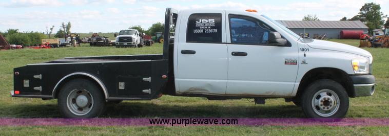 image for item K8917 2007 Dodge Ram 3500HD Quad Cab flatbed pickup truck