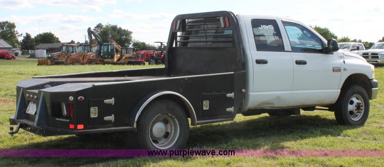 image for item K8917 2007 Dodge Ram 3500HD Quad Cab flatbed pickup truck