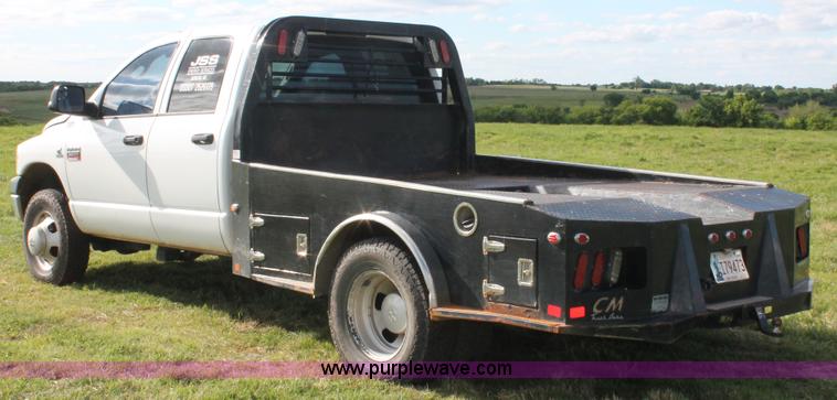 image for item K8917 2007 Dodge Ram 3500HD Quad Cab flatbed pickup truck