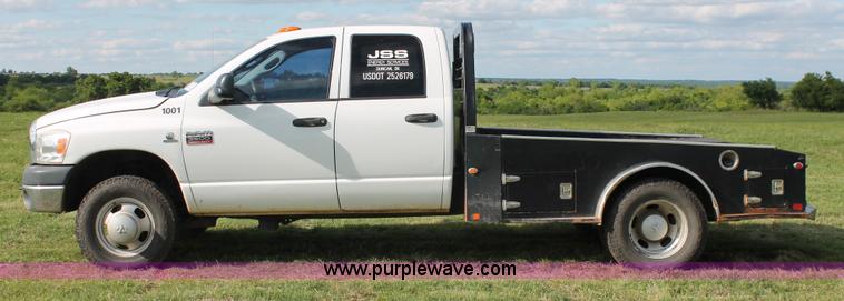 image for item K8917 2007 Dodge Ram 3500HD Quad Cab flatbed pickup truck