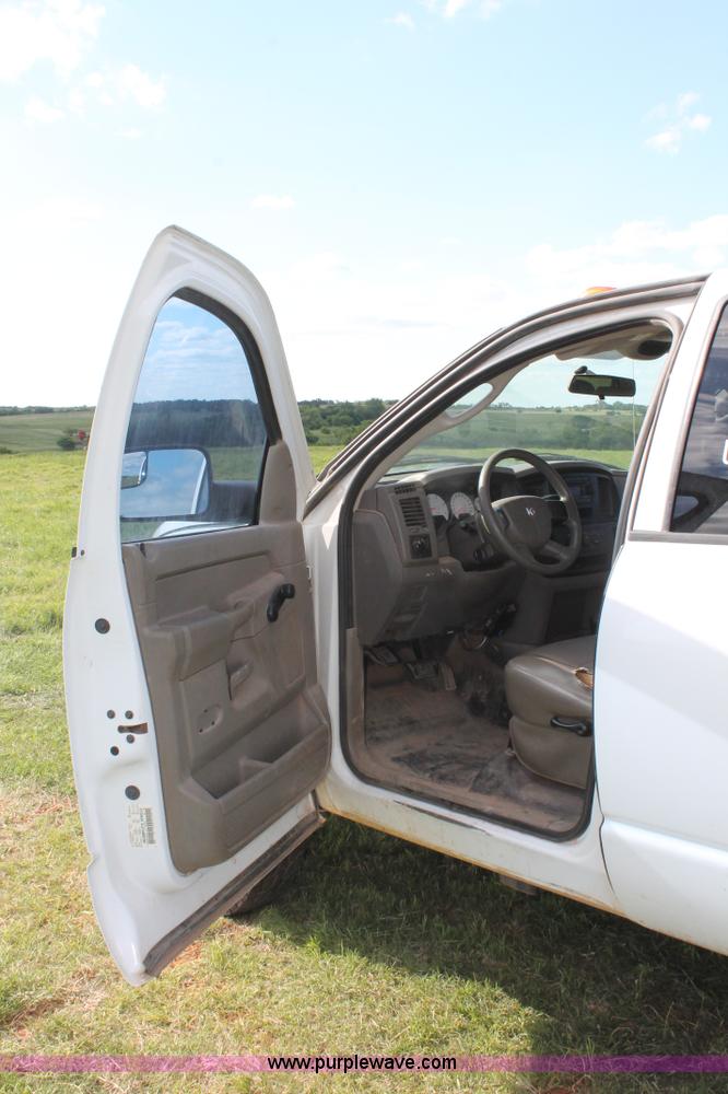 image for item K8917 2007 Dodge Ram 3500HD Quad Cab flatbed pickup truck