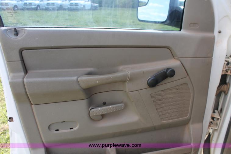 image for item K8917 2007 Dodge Ram 3500HD Quad Cab flatbed pickup truck