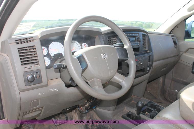 image for item K8917 2007 Dodge Ram 3500HD Quad Cab flatbed pickup truck