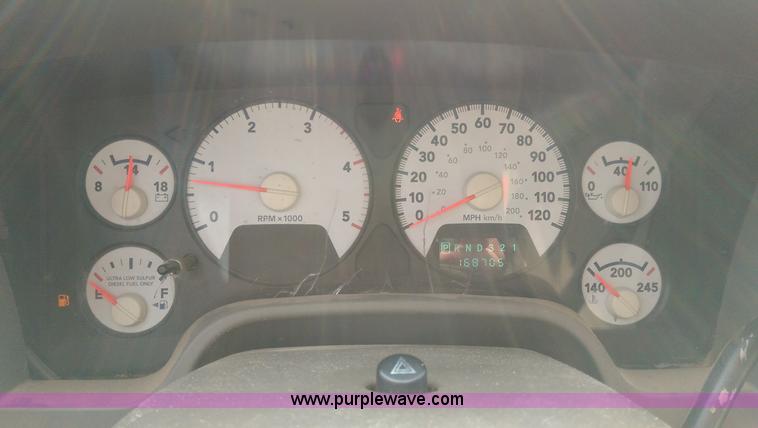 image for item K8917 2007 Dodge Ram 3500HD Quad Cab flatbed pickup truck