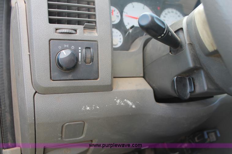 image for item K8917 2007 Dodge Ram 3500HD Quad Cab flatbed pickup truck