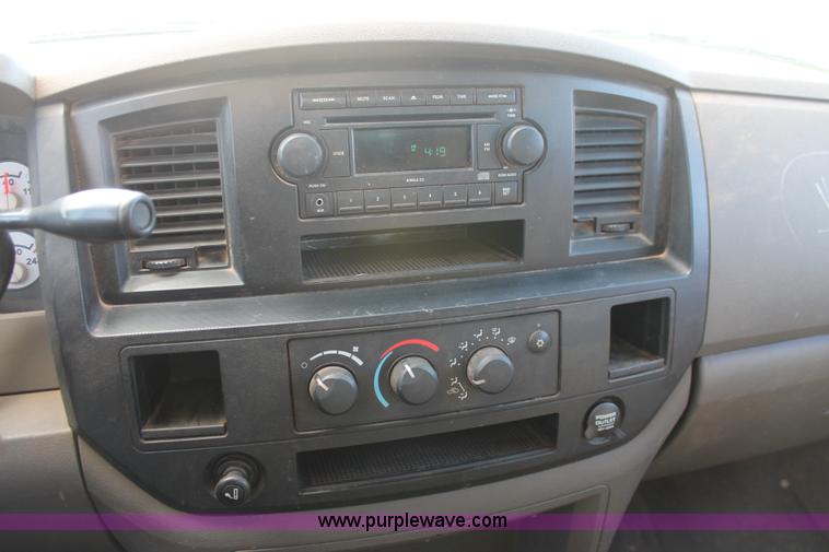 image for item K8917 2007 Dodge Ram 3500HD Quad Cab flatbed pickup truck