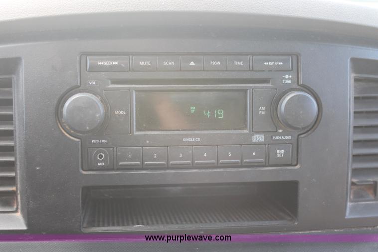 image for item K8917 2007 Dodge Ram 3500HD Quad Cab flatbed pickup truck