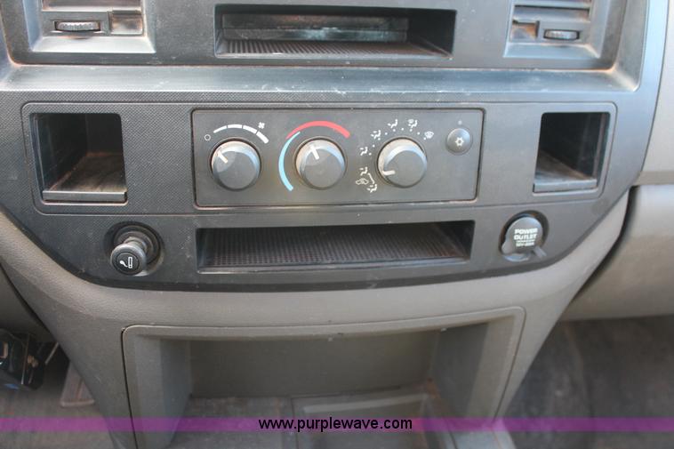 image for item K8917 2007 Dodge Ram 3500HD Quad Cab flatbed pickup truck