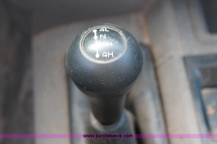 image for item K8917 2007 Dodge Ram 3500HD Quad Cab flatbed pickup truck