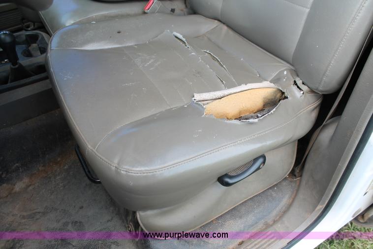 image for item K8917 2007 Dodge Ram 3500HD Quad Cab flatbed pickup truck