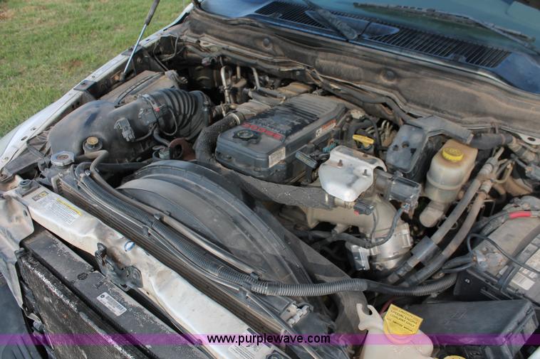 image for item K8917 2007 Dodge Ram 3500HD Quad Cab flatbed pickup truck