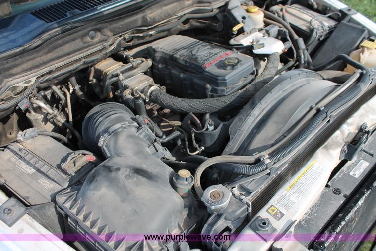 image for item K8917 2007 Dodge Ram 3500HD Quad Cab flatbed pickup truck