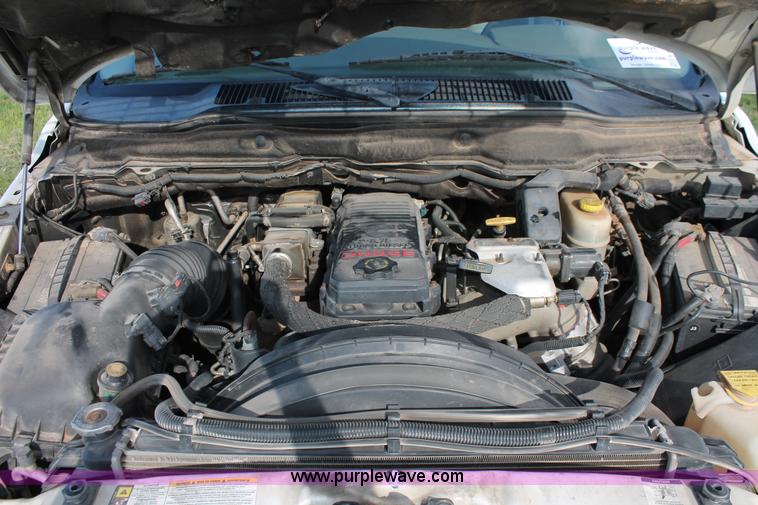 image for item K8917 2007 Dodge Ram 3500HD Quad Cab flatbed pickup truck